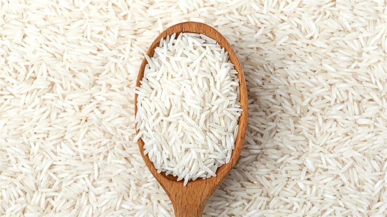 White rice on wooden spoon
