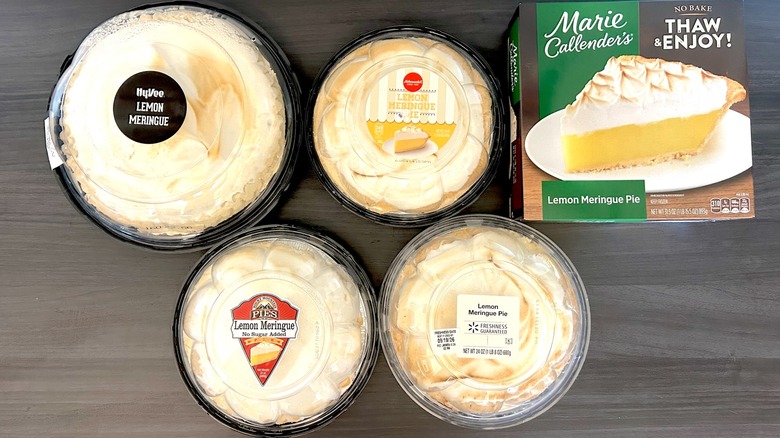Assorted lemon meringue pies in packaging from various grocery stores