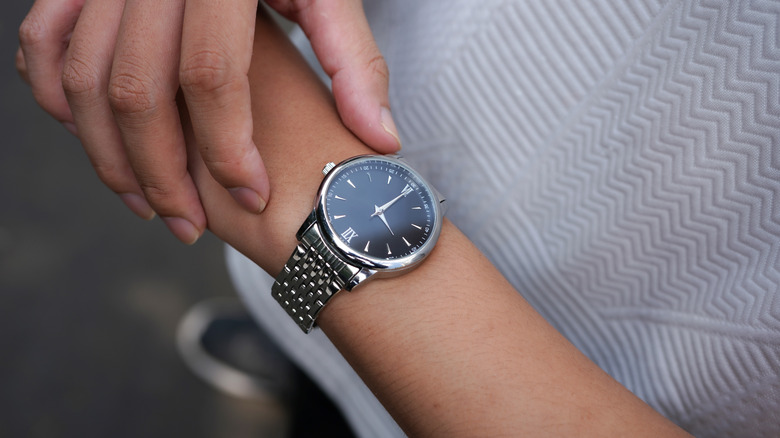 Person checking their watch