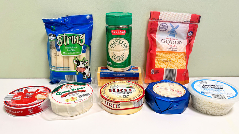 Several Aldi cheeses arranged together in two rows