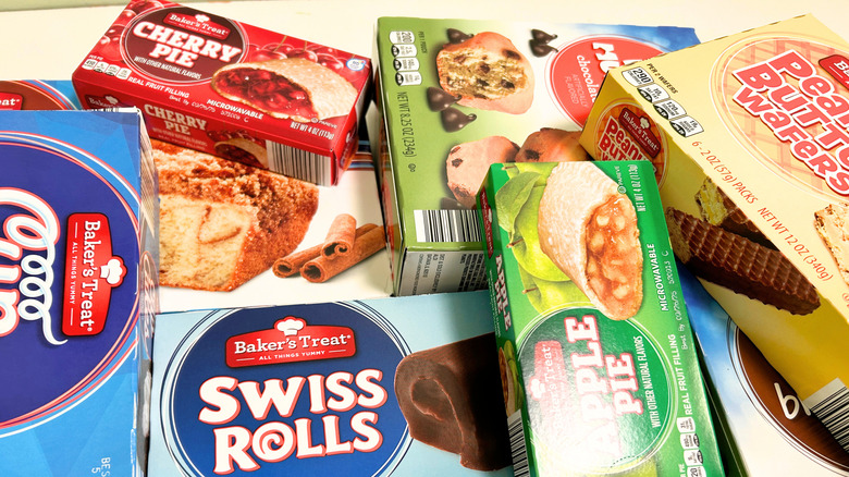 Several Aldi pre-packaged bakery treats piled together, close up