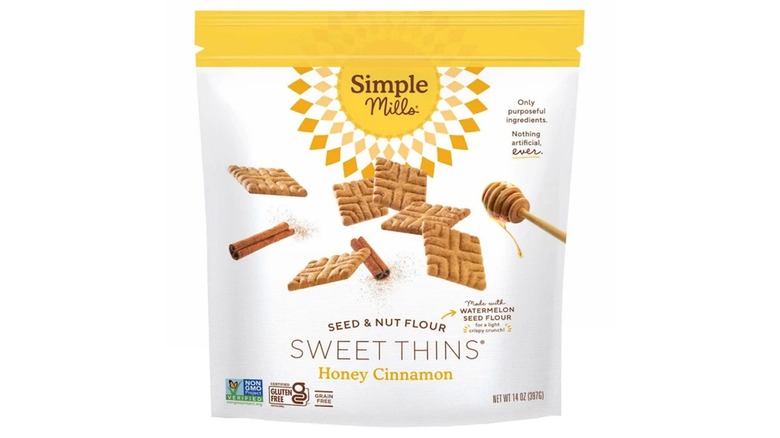 A white and yellow bag of 2 Simple Mills honey cinnamon sweet thins
