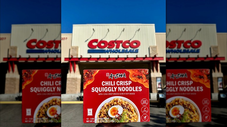 A 12-pack of A-Sha chili crisp squiggly noodles, outside a Costco