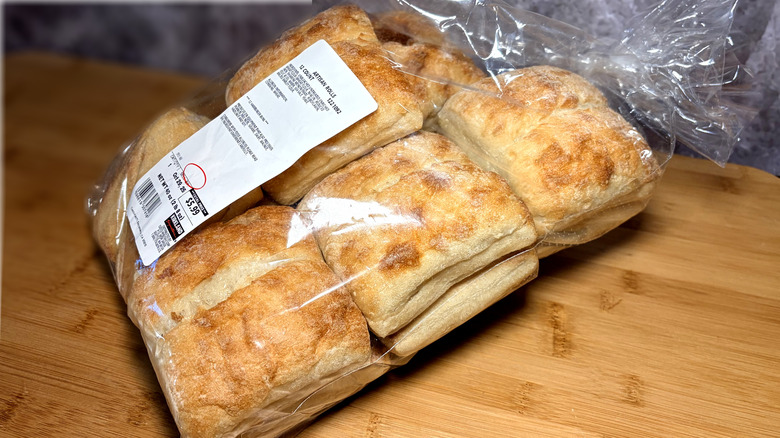 package of Costco artisan rolls on wooden table