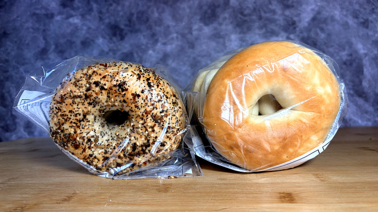 two packages of different bagels