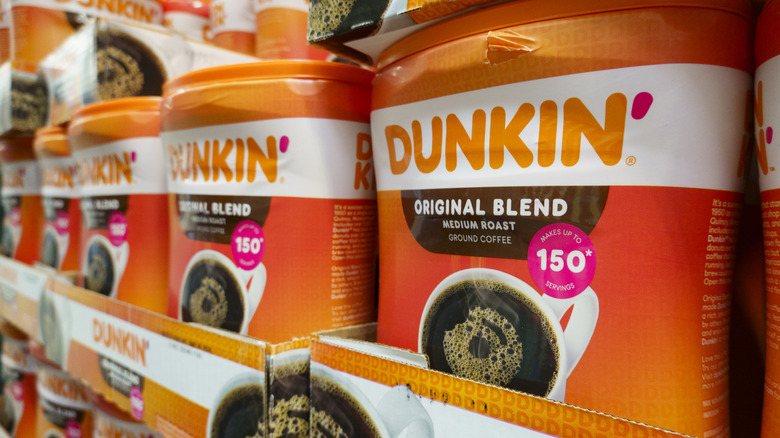 Orange buckets of Dunkin' original blend coffee