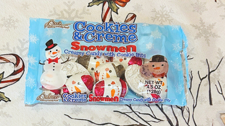 Palmer Cookies and Creme Snowmen on top of a festive red and white background
