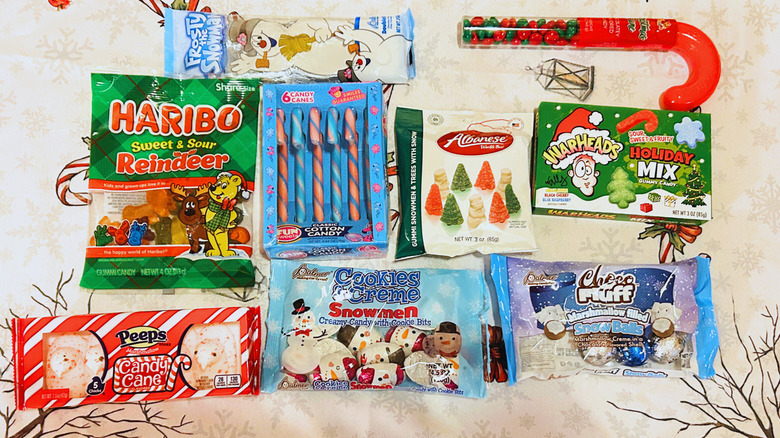 An assortment of Dollar Tree Christmas candy options against a festive red and white background