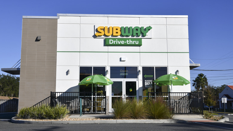 Front exterior of Subway restaurant on sunny day