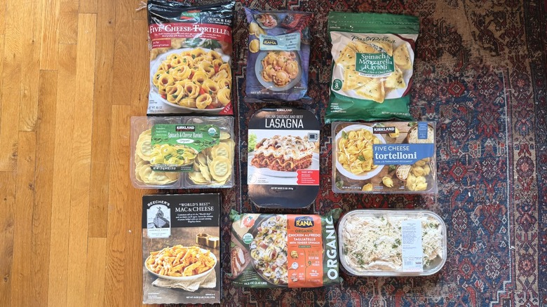 Packaged pastas from Costco arranged on the ground.