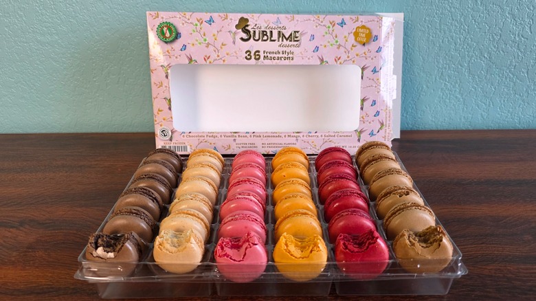 Sublime Desserts macarons in assorted flavors box with open macaron tray in front