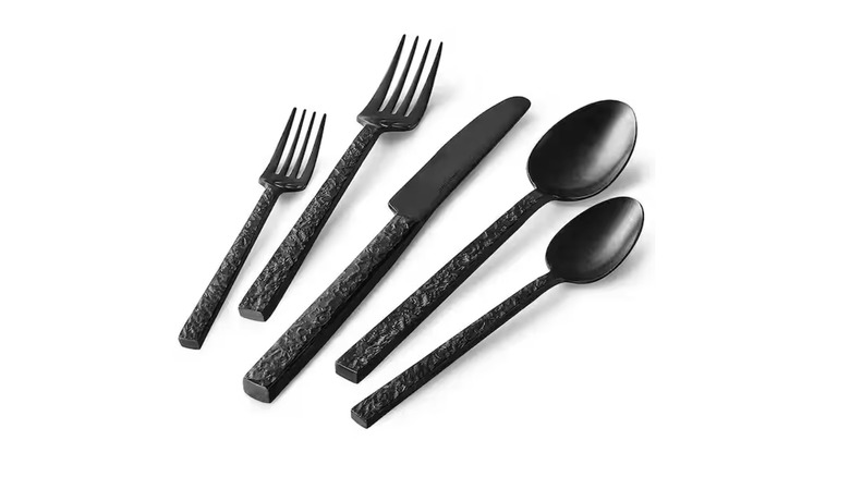 Two spoons, two forks, and a knife