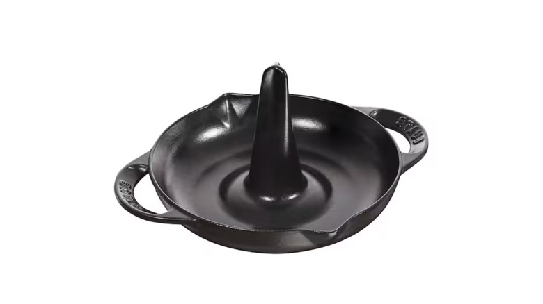 A cast iron pan with a point in the middle