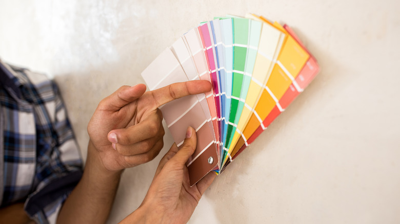 Couple choosing paint colors for a kitchen