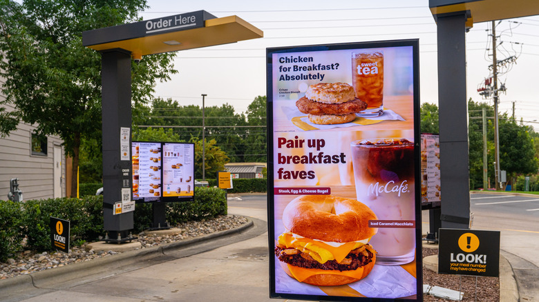 McDonald's drive thru with breakfast menu screen