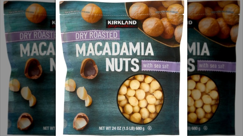 Kirkland Signature Dry Roasted Macadamia Nuts on a white background