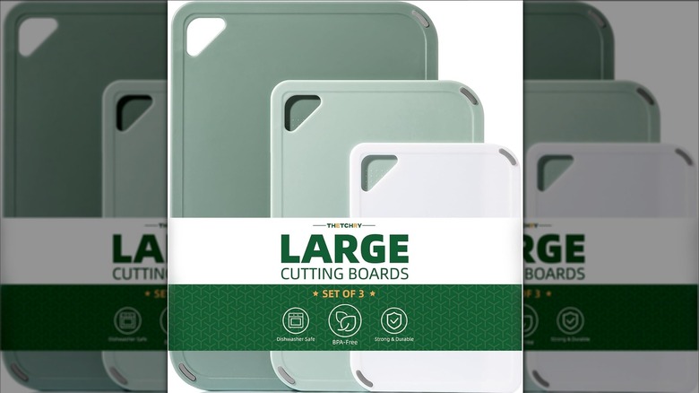 set of three green plastic cutting boards