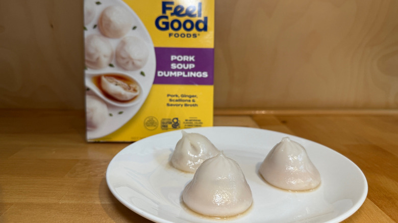 Feel Good Food soup dumplings on a plate with a box in the background