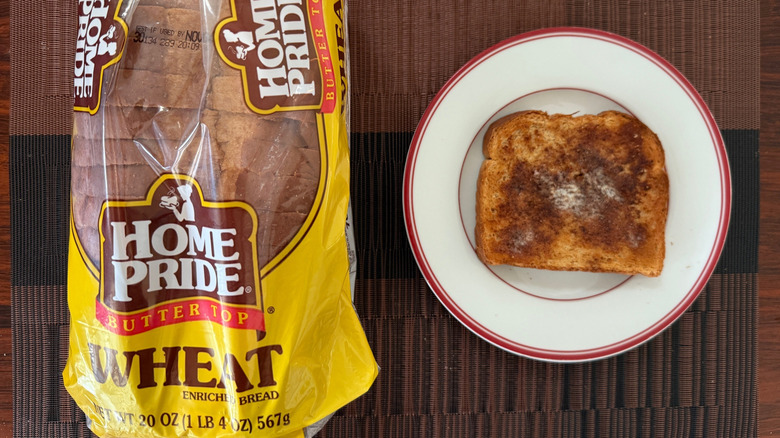 Home Pride Butter Top Wheat loaf and toasted slice with butter on plate