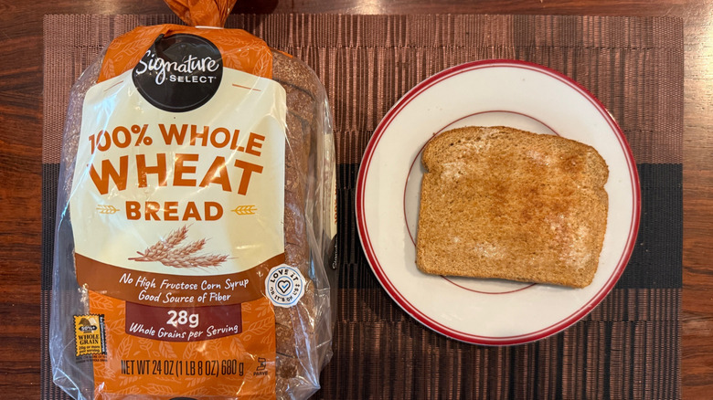 Signature Select whole wheat loaf and toasted slice with butter on plate