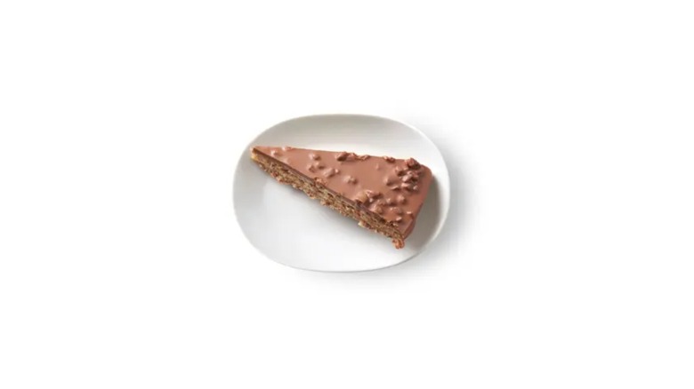 A top-down view of the IKEA caramel almond cake on a white plate
