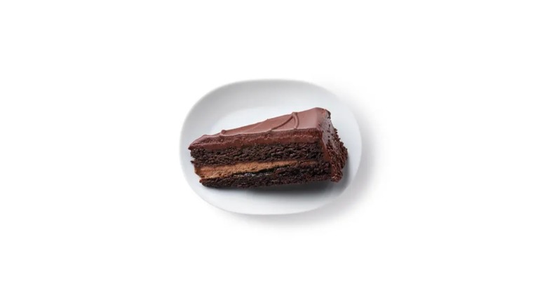 A top-down view of a slice of the chocolate cake from IKEA on a white plate