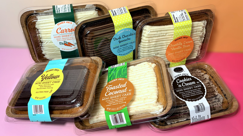 six packaged trader joes mini sheet cakes arranged on table