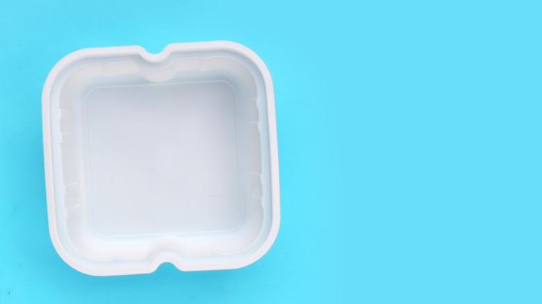An overhead view of a plastic takeout container