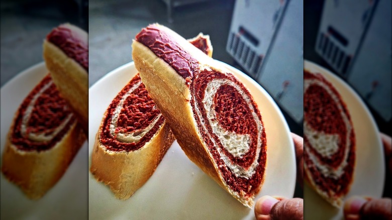 Two slices of harlequin bread on white plate