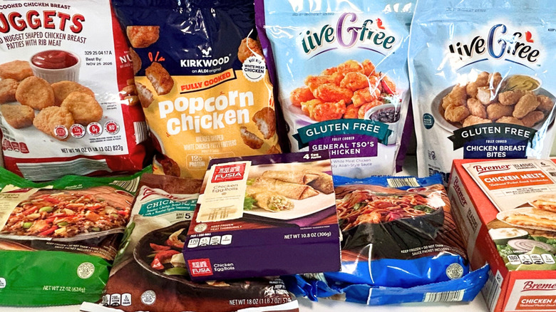 Close up of several Aldi prepared chicken products arranged together
