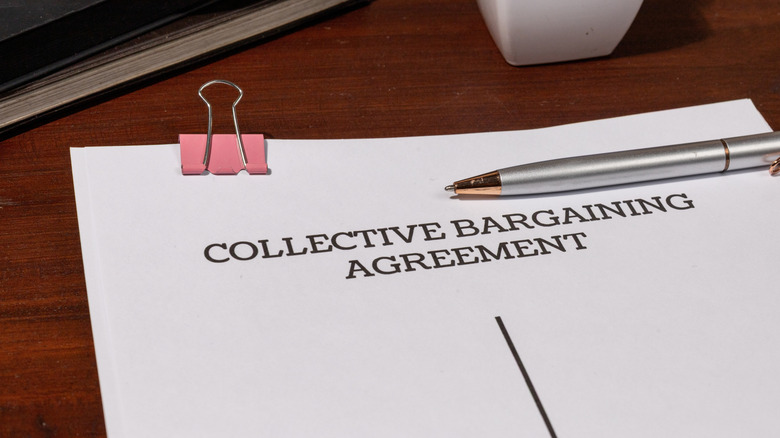 Collective bargaining agreement on desk