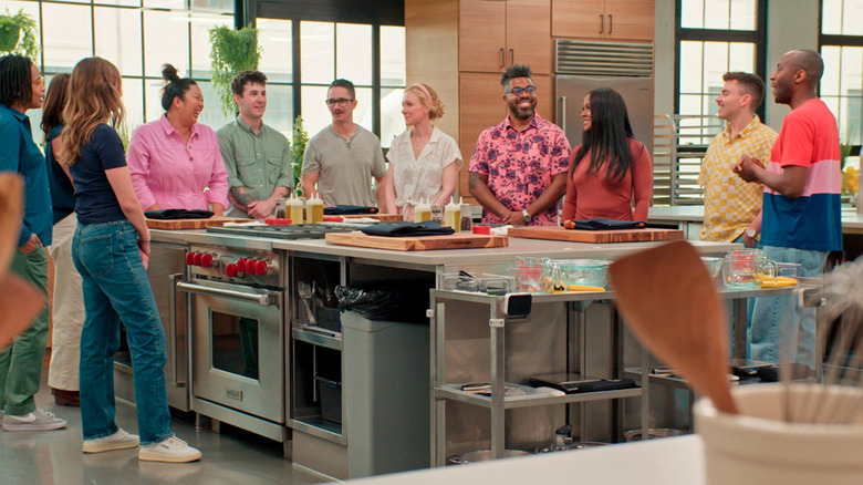 the cast in kitchen at America's Test Kitchen