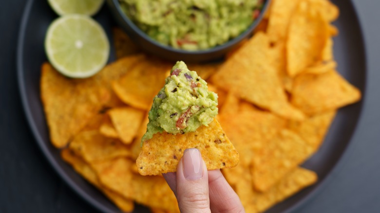 Chip with guacamole on it