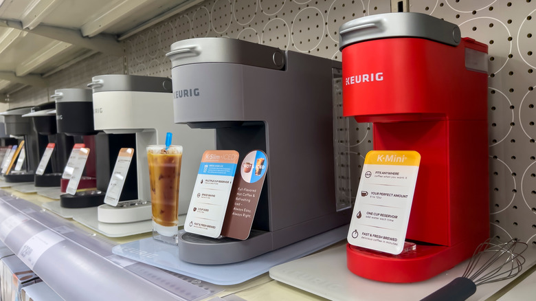 Keurig mini machines lining the grocery store aisle