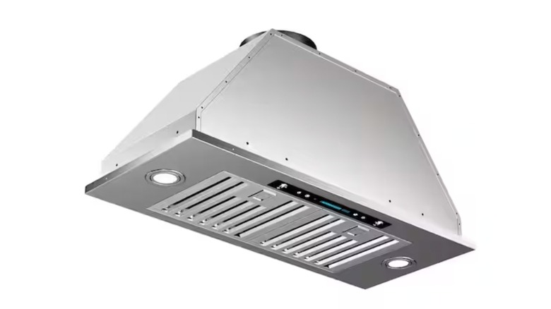 A Throes 30 inch range hood in stainless steel