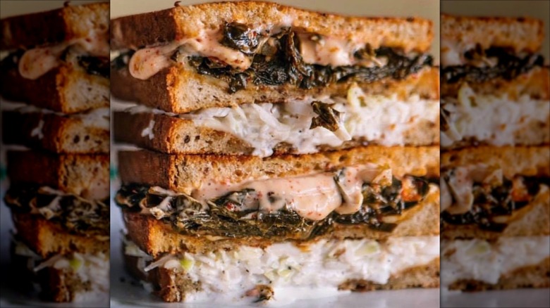 Collard Green melt sliced in half and stacked up