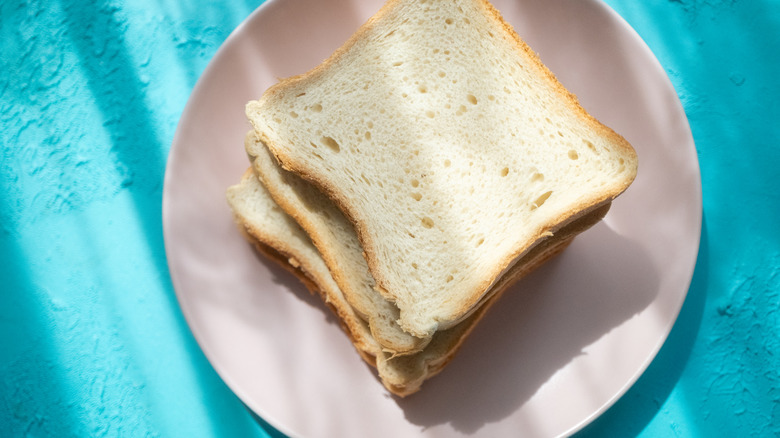 Slices of white bread on a plate