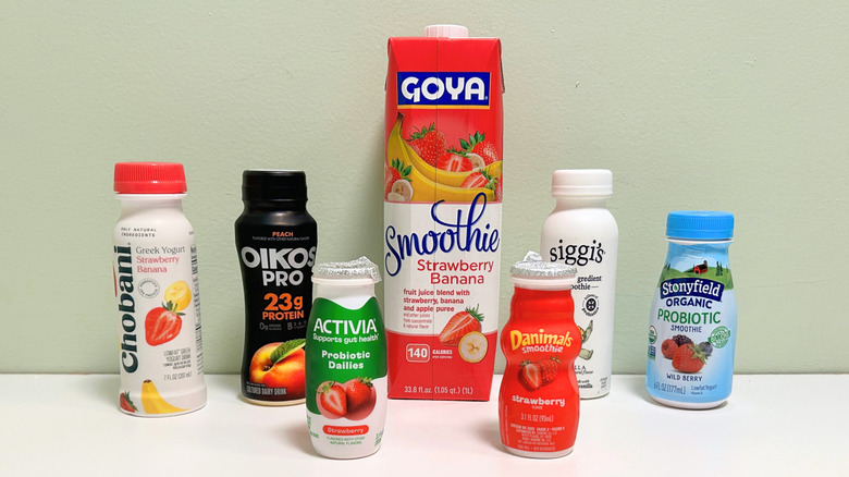 Several bottles of smoothies lined up together