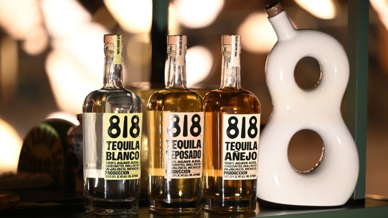 Bottles of 818 Blanco, Reposado, Añejo, and Reserva tequila