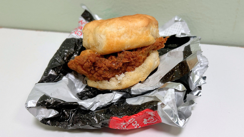 A Chick-fil-A Chicken Biscuit on a folded wrapper