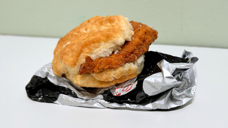 A Spicy Chicken Biscuit on a wrapper