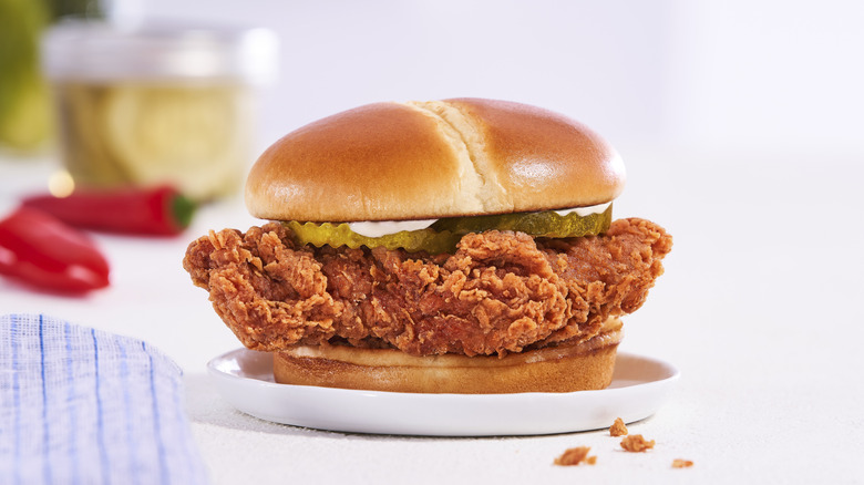 Bojangles crispy chicken sandwich on a white plate