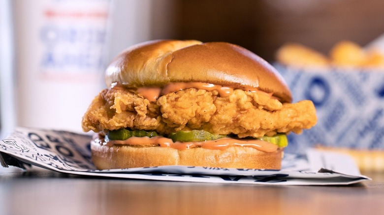 Zaxby's fried chicken sandwich on branded paper