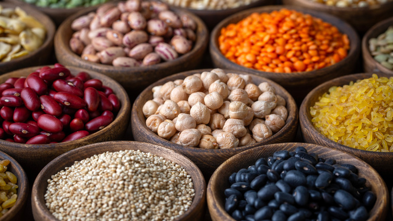 Bowls of colorful dried beans and grains
