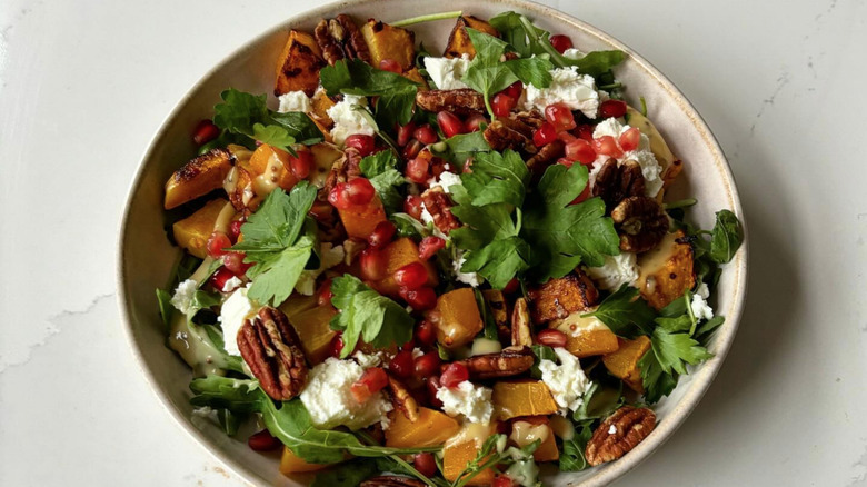 Pomegranates, cheese, walnuts salad