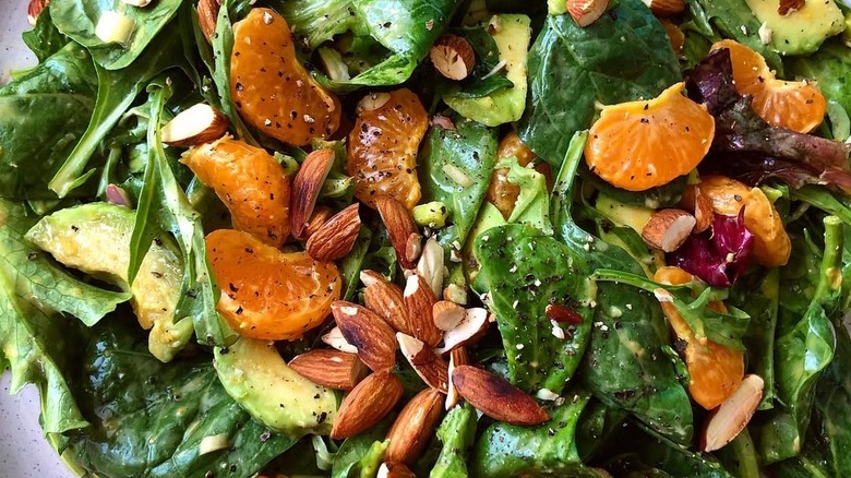 Salad with almonds, tangerines, avocado