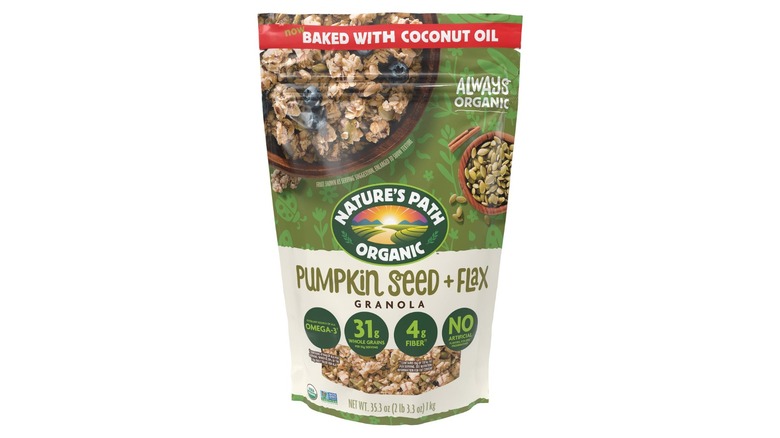 Bag of Nature's Path Organic Pumpkin Seed Flax Granola against a white background.