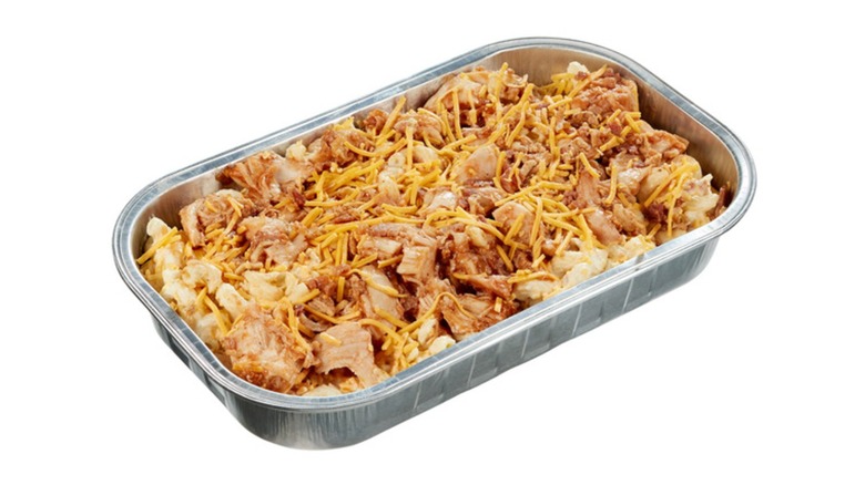 A tray of unheated Kirkland Signature BBQ Chicken Mac and Cheese with Bacon