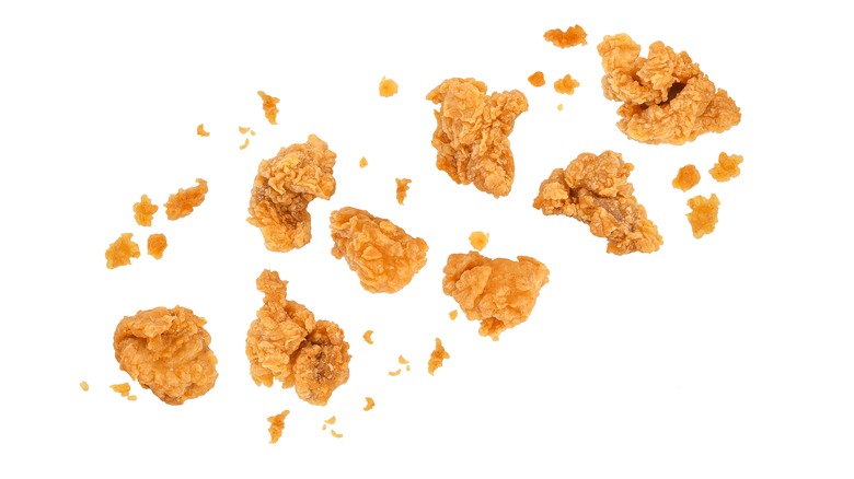 popcorn chicken on white background