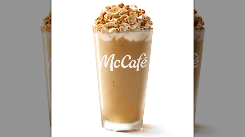 A McDonald's Caramel Apple drink on a white background